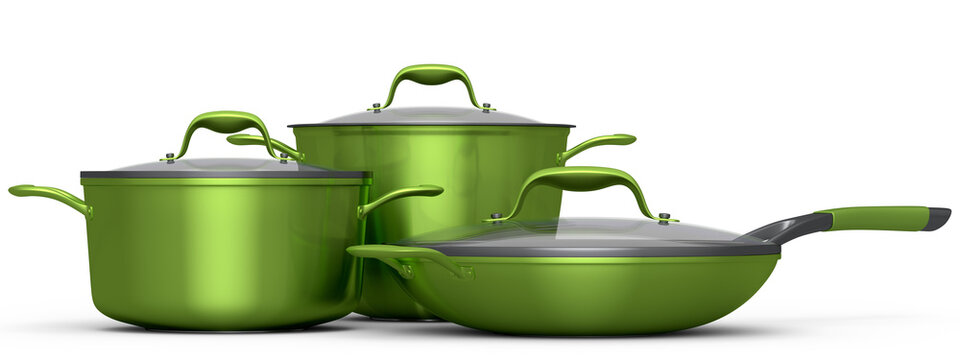 Set of stewpot, frying pan and chrome plated cookware on white background