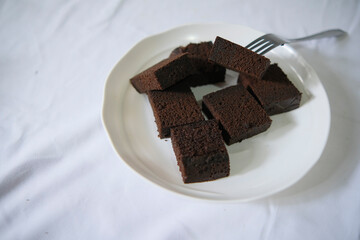 Delicious brownie cake served on a white plate