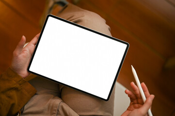 Female using digital wireless portable tablet touchpad.