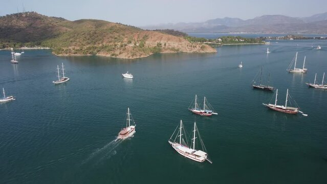 Awesome aerial view of tourist ship crossing Fethiye Bay, Turkey