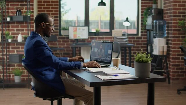 Executive assistant meeting with manager on videoconference to discuss business strategy. Chatting with colleague on online remote video call, teleconference web conversation.