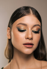 Fototapeta premium Beauty portrait of a beautiful girl with a smoky eye