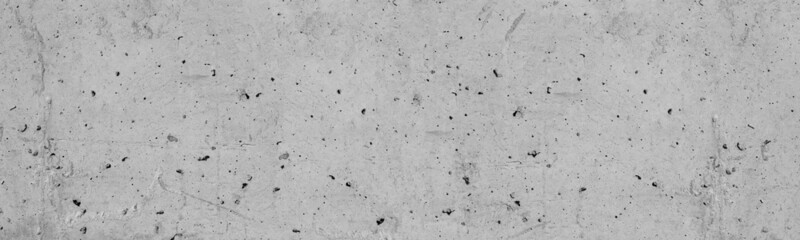 Old shabby gray concrete wall wide panoramic texture. Rough cement slab grungy backdrop. Abstract...
