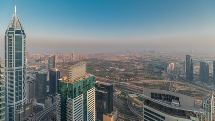 Fototapeta na wymiar Panorama of Dubai Marina with JLT skyscrapers and golf course timelapse, Dubai, United Arab Emirates.