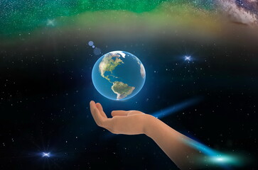 earth globe in hands on front blue starry sky nebula hold  world peace concept nature background