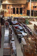 Close-up of furniture placed in a large mahogany furniture store
