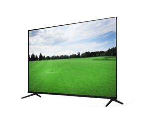 Modern wide screen TV monitor showing beautiful golf course with green grass isolated on white