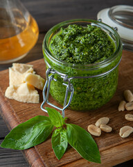 close up of pesto sauce with basil cheese and olive oil