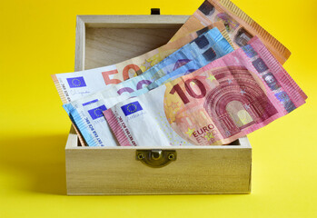 euro banknotes in a box