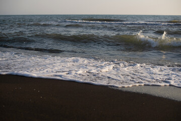 Ureki, Georgia, black sand on the beach sea 