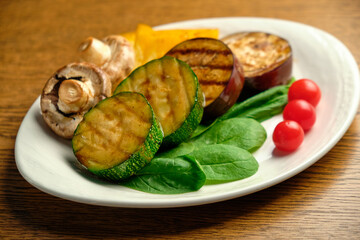 Grilled vegetables with champignons and fresh herbs