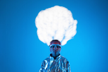 Woman under cloud computing against blue background