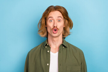 Portrait of attractive funky childish amazed red-haired guy pout lips stupor isolated over bright...