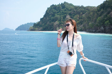 Girl pose action on the ship head near Nyaung oo phee island