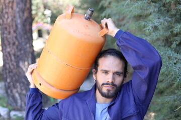 Propane tank delivery man with attractive look