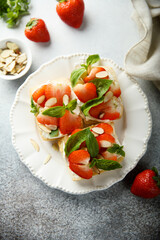 Strawberry crostini with basil and almond 