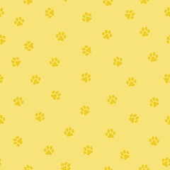 seamless paw prints. white background. cute yellow animal tracks on a yellow background. vector texture. fashionable print for textiles, wallpaper and packaging.