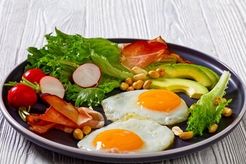 fried eggs, lettuce, avocado, radish, peanuts, ham