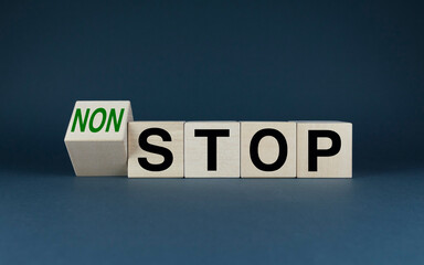 Stop or non-stop. Cubes form the words Stop to non-stop