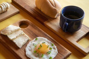 Breakfast - Healthy - Banana, Cheese, Eggs, Bread, Coffee - Yellow Background - serie 