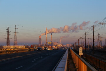 Fototapeta na wymiar Pollution.industry metallurgical plant dawn smoke smog emissions bad ecology.