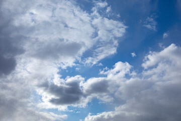 Fototapeta premium Beautiful clear blue sky with clouds, empty background with sky cloudscape