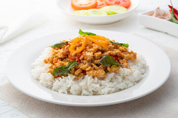 Rice topped with stir-fried minced chicken and basil (Gai Pad Grapow).asian food