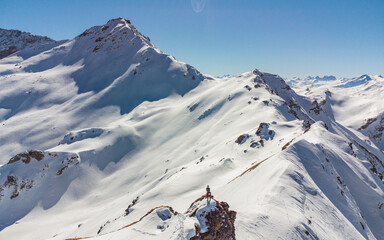 Hiking in Swiss Alps in winter