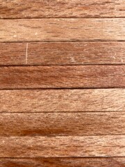 light wood planks strung side by side