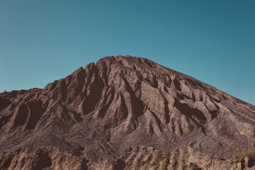 crush stone mountain with blue sky