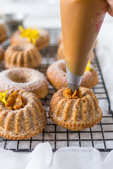 Cinnamon doughnuts and cakes with dulce de leche