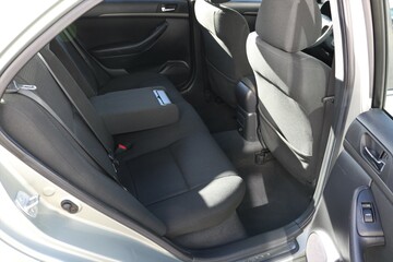 Auto interior with back seats.