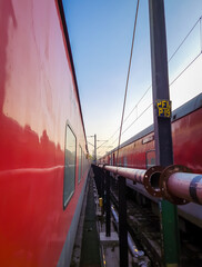 train parked at railway track with flat sky at morning from different angle