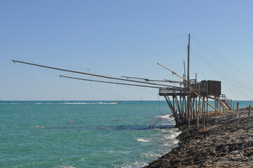 Fototapeta na wymiar Trabucco Gargano fishing tower in Vieste