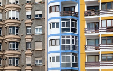Row of houses, different construction and color