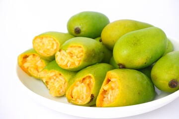 Mango Sticky Rice on white plate isolated on white backgroun.
