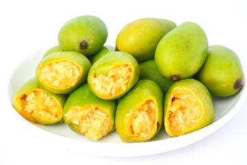 Mango Sticky Rice on white plate isolated on white backgroun.