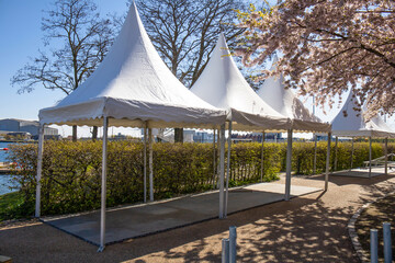 Tents in the park preparing for the festival. High quality photo