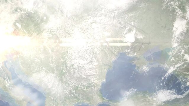 Earth zoom in from outer space to city. Zooming on Bacau, Romania. The animation continues by zoom out through clouds and atmosphere into space. Images from NASA