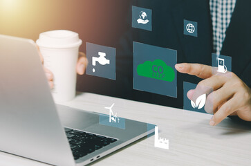 businessman hand touches global warming Renewable energya virtual screen. Reduce CO2 emissions. Sustainable business development concept .