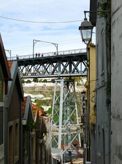 Fototapeta na wymiar Steel piers of the Dom Louis Bridge in Porto - Portugal