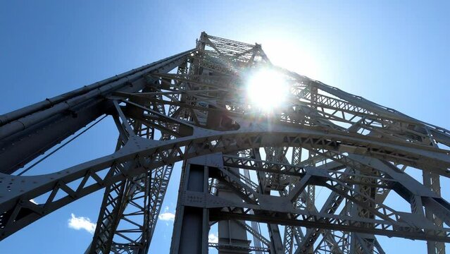 View from underneath the Duluth Lift Bridge in Minnesota at noon. Bright sun shining down
