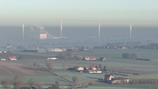 aerial images show the windmills of the wind farm near westouter in the Flemish countryside