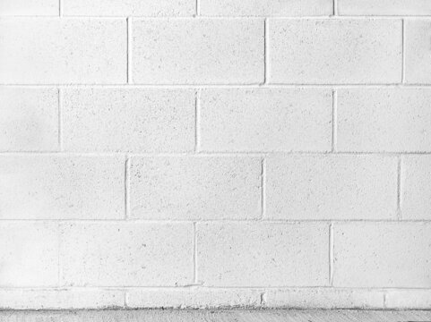 Fototapeta Grain and rough detail on rectangle white painted brick wall, seamless. Horizontal pattern of structure outside and inside of building. Plastering wall, industry minimal style. Texture background.