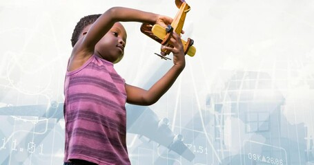 Animation of happy african american boy playing with plane toy over silhouette of plane