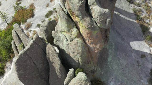 Close up of rock formations of Valle de los Monjes, Chihuahua, rising aerial looking down