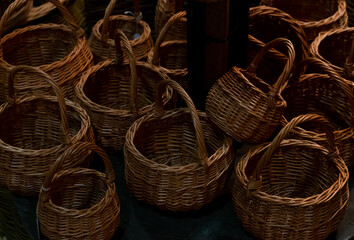 Traditional wicker picnic baskets woven from willow tree branches. Shallow depth of field. 