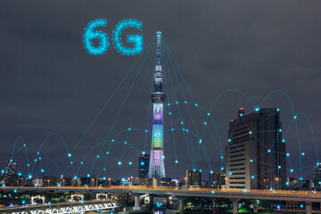 6G network digital and internet of everythings (IOT) on cityscape background.6G network wireless...