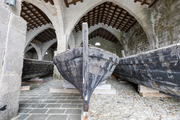 Favignana, (Egadi) Aegadian Islands, Trapani, Sicily, Italy - march 15 2022: ancient wooden boats used for fishing in famous Florio tuna factory or tonnara at Favignana island.