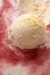 Organic strawberry ice cream texture and ball.